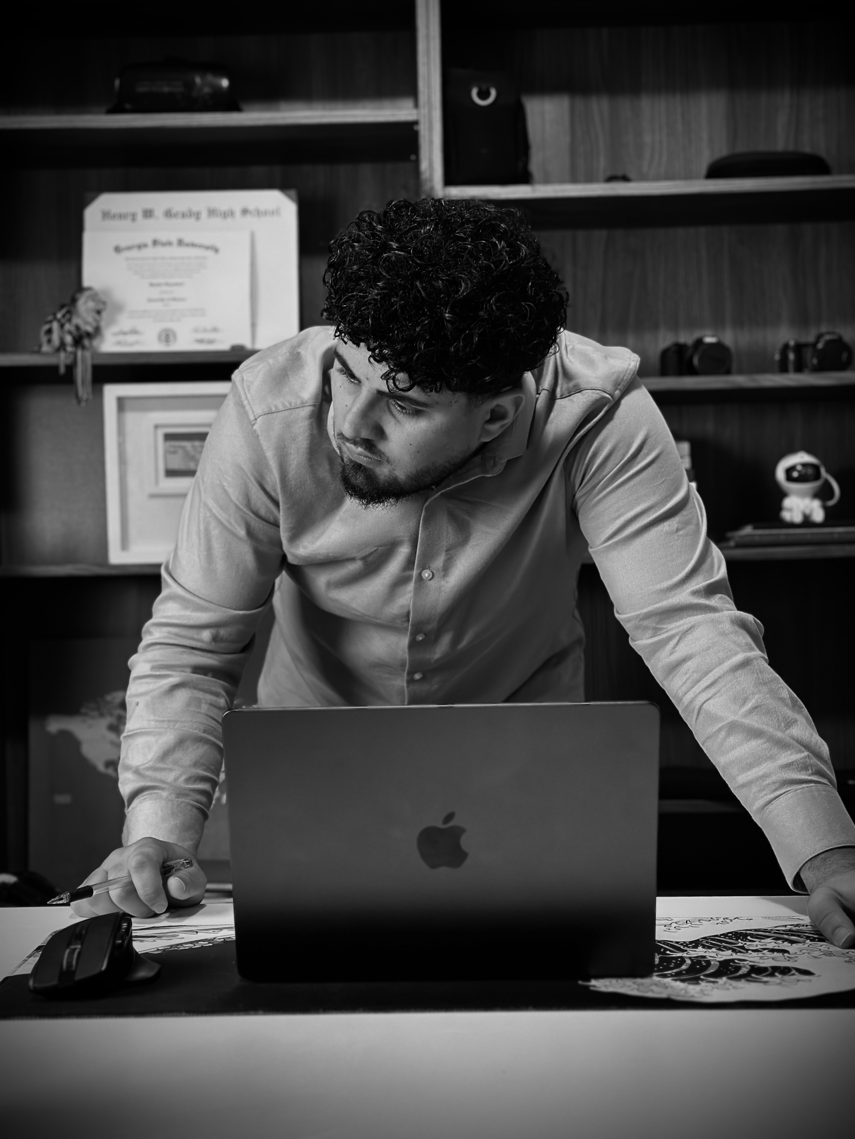 Kbib Walk at his desk